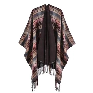 Detailed view of Scottish plaid shawl with classic earth-tone check and tassel fringe