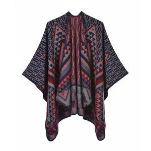 Bohemian knit poncho cape with geometric patterns in navy blue, burgundy and grey