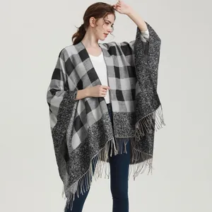 Classic black and grey buffalo plaid shawl with fringe hem, elegant autumn winter poncho