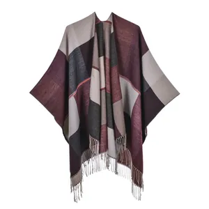 Women's jacquard poncho shawl with geometric color blocks and fringe tassels