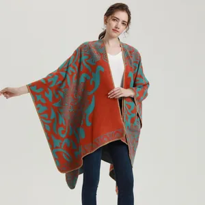 Vintage dames sjaal van imitatie kasjmier in oranje en blauwgroen met paisley motief