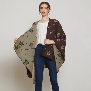 Detail of double-sided knit shawl showing star pattern and handmade stitched edges