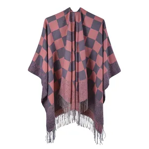 Detailed view of pink and grey checkered shawl with fine fringe edges for winter