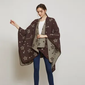 Detail of soft knit shawl featuring a double-sided star and polka dot pattern