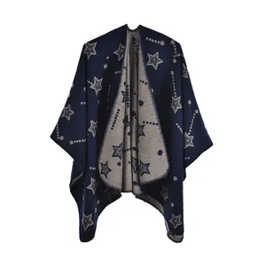 Detailed view of dark blue and light grey jacquard star knit shawl with fine edge stitching