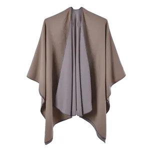 Detail of light brown and dark purple double-sided pashmina shawl with clean edges
