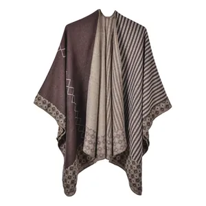 Detailed knit texture and geometric pattern on a striped women shawl cape
