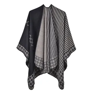 Detail of knit stripe and diamond pattern on a soft autumn winter shawl wrap