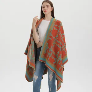 Ethnic knit shawl cloak with orange and blue geometric patterns for women's styling