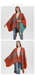 Detailed texture of thick orange and blue plaid shawl with fine stitching edge