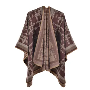 Close-up of vintage camo plaid knit shawl with floral jacquard texture and thick fabric