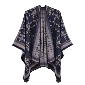 Detailed view of navy blue leopard knit shawl with fine gray stripes and hem stitching