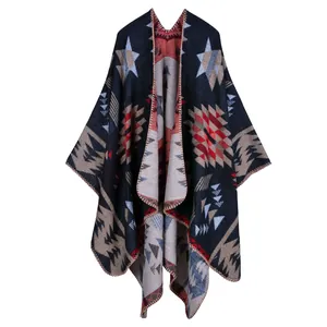 Ethnic knit shawl cloak for women in blue and red featuring geometric star patterns