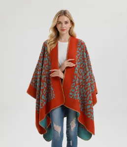 Detailed knit of orange and teal leopard print cashmere-like winter poncho cape