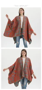 Detail of bohemian women's poncho with vintage scrollwork jacquard and thick knit fabric