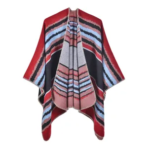 Detail of knit shawl featuring multicolor stripes and high-quality lockstitch edges