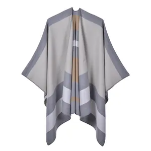 Detail of multi-color striped knitted shawl showing thick texture and fine edge craftsmanship