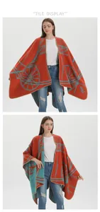 Detail showing the vintage carriage pattern on thick knit orange wrap shawl cardigan