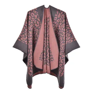 Detail shot of the knitted leopard print shawl with delicate edge stitching