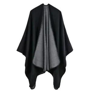 Women's jacquard shawl with double-sided black and grey knit design and stitched edges
