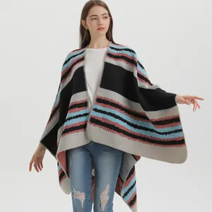 Retro knitted shawl poncho with ethnic stripes and stitched edges for autumn travel