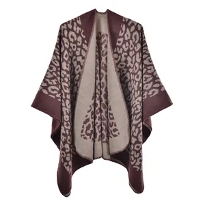 Close-up of leopard print shawl showing thick cashmere-like texture and edge stitching