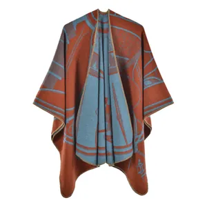 Detail of knitted winter shawl with abstract jacquard pattern and premium lock-stitch edges