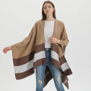 Women's autumn knit poncho shawl featuring classic striped patterns and cozy camel tones