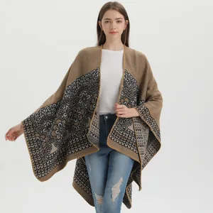 Women's knitted shawl poncho with vintage floral patterns in earthy brown tones