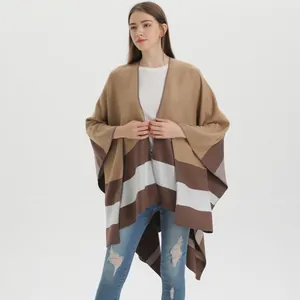 Women's stylish striped knit poncho wrap with elegant color block stripes for autumn