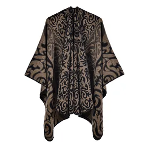 Detail of vintage baroque pattern on knitted women's shawl with elegant scrollwork