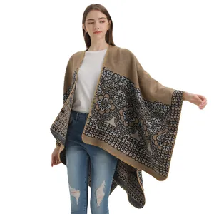 Women's knit poncho cape shawl with floral embroidery and open front in tan color