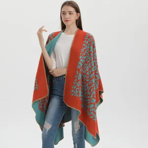 Orange leopard print cashmere shawl poncho with contrast stitching and split front