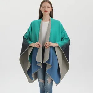 Chic tricolor gradient knit poncho cape in blue and grey for stylish autumn layering