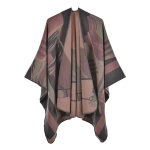 Detail of thick knit women's shawl featuring vintage abstract geometric figure patterns