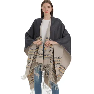 Knitted shawl poncho with geometric bohemian patterns and fringe hem for women