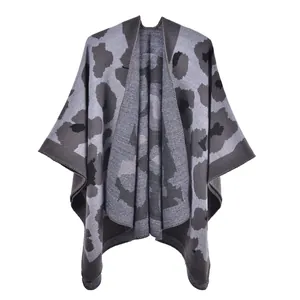 Macro detail of leopard print knit texture on premium oversized women shawl