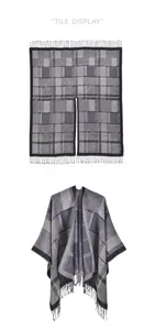 Detailed tile display of a classic grey plaid knit poncho shawl with soft fringe trim