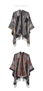 Flat lay of plaid knit shawls with fringe detailing in classic check patterns