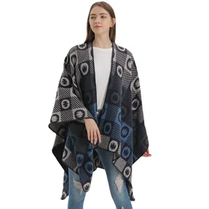 Navy and grey jacquard knit open front shawl with geometric patterns and fringe