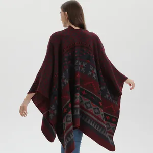 Bohemian geometric knit shawl poncho in deep red and navy blue seen from back
