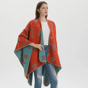 Knitted star pattern cape shawl in bright orange and cyan with split front design