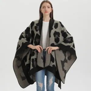 Women's leopard print knit poncho wrap shawl in dark grey and black leopard pattern