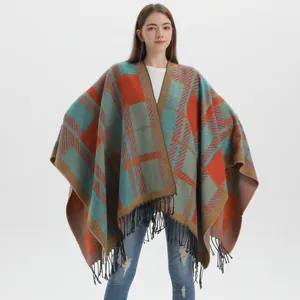 Women winter oversized knit shawl cape with geometric plaid patterns and fringe tassels