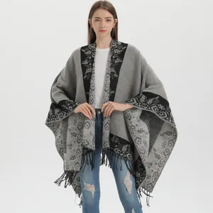 Women's split cape shawl in gray and black knit with fringe trim and vintage floral patterns