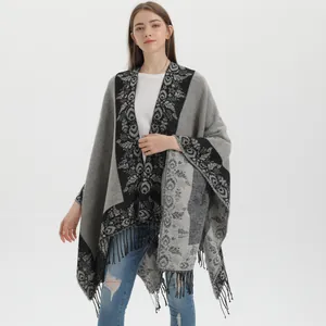 Women's vintage floral knit poncho with tassels and split front in grey and black