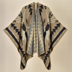 Detail of tribal pattern knit shawl with geometric prints and soft fabric texture