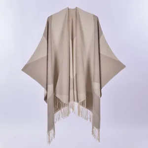 Women's reversible geometric star pattern shawl with tassels in beige and brown tones