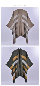 Flat lay of striped knit ponchos in khaki and forest green with soft fringed edges