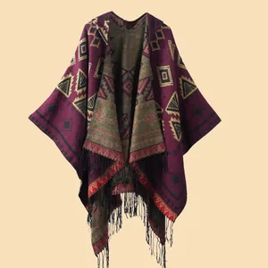 Ethnic geometric hooded poncho for women with purple tribal pattern and black fringes